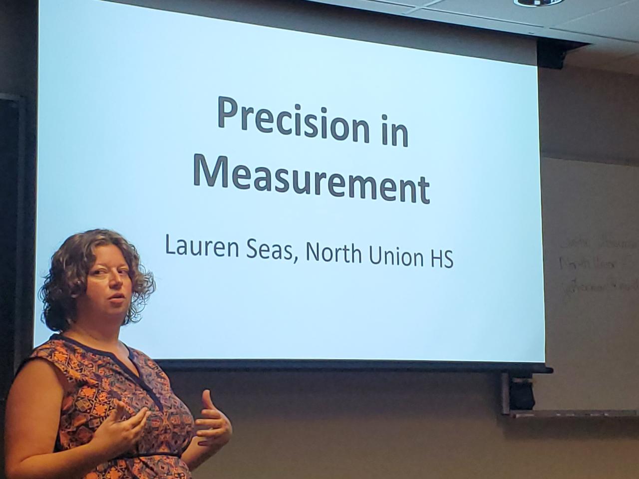 a teacher giving a presentation